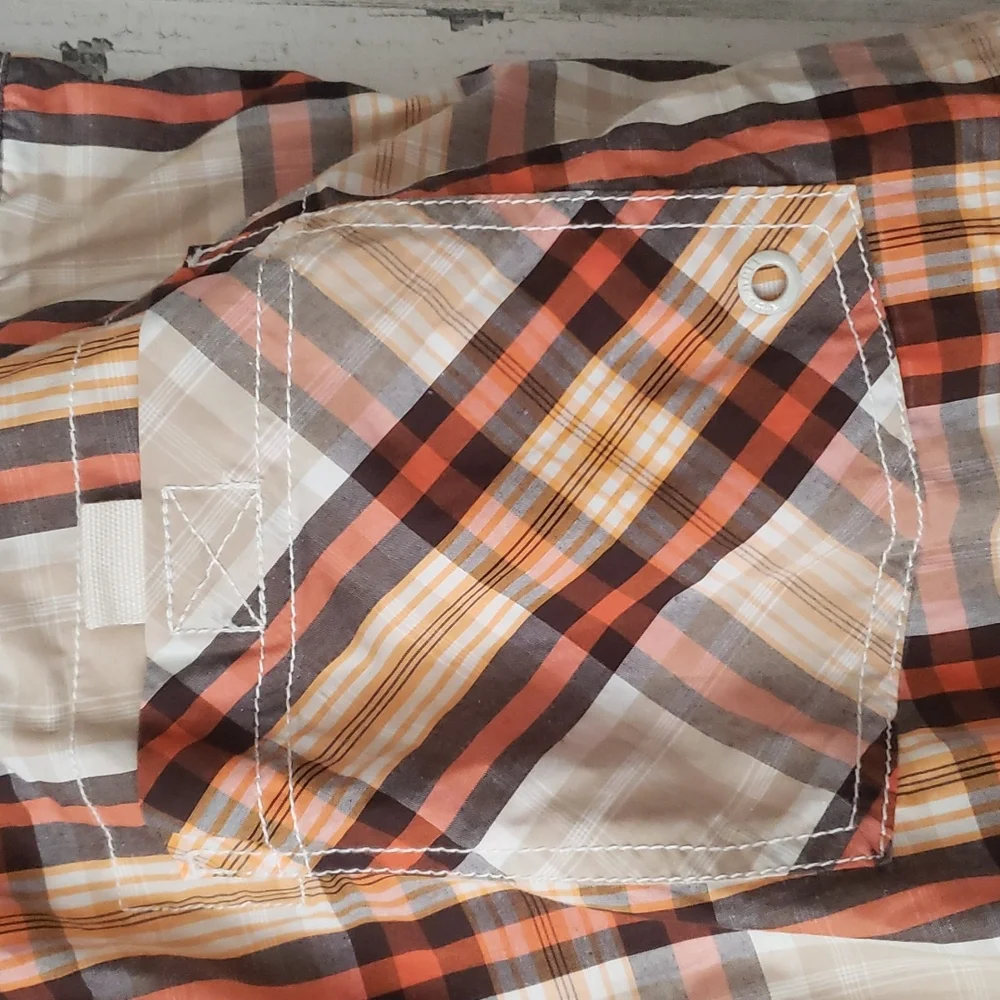 Old Navy plaid swim shorts tan, orange, brown. Pockets, built in brief. Size XXL